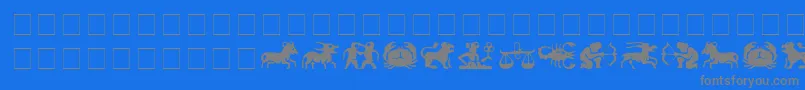 EileensZodiac-Schriftart – Graue Schriften auf blauem Hintergrund