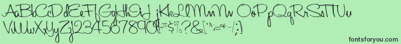 AboutRegular-fontti – mustat fontit vihreällä taustalla