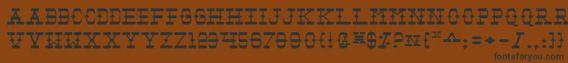 Tombv2e-fontti – mustat fontit ruskealla taustalla