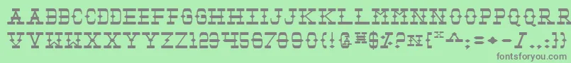 フォントTombv2e – 緑の背景に灰色の文字