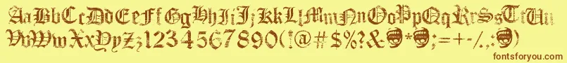 フォントFaithCollapsing – 茶色の文字が黄色の背景にあります。