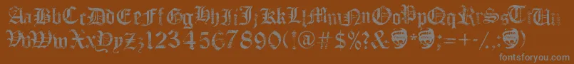 FaithCollapsing-fontti – harmaat kirjasimet ruskealla taustalla