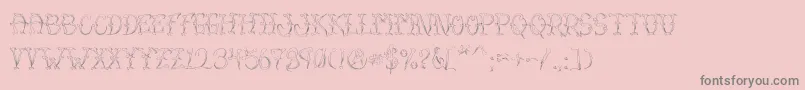 VtcSumislasheroneskinned-Schriftart – Graue Schriften auf rosa Hintergrund