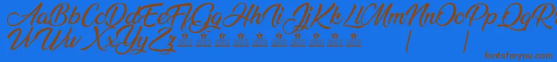 AnandaPersonalUse Font – Brown Fonts on Blue Background