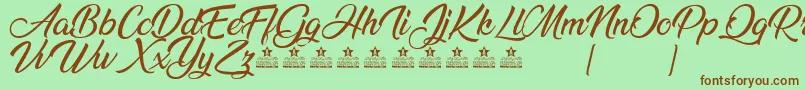 AnandaPersonalUse Font – Brown Fonts on Green Background