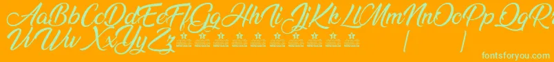 AnandaPersonalUse Font – Green Fonts on Orange Background