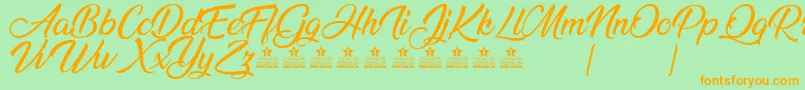 AnandaPersonalUse Font – Orange Fonts on Green Background