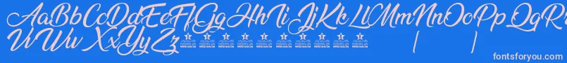 AnandaPersonalUse Font – Pink Fonts on Blue Background