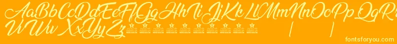 AnandaPersonalUse Font – Yellow Fonts on Orange Background