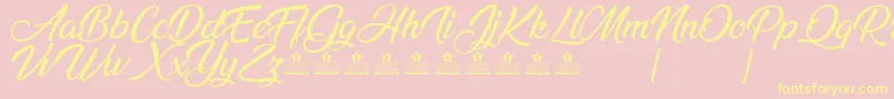 AnandaPersonalUse Font – Yellow Fonts on Pink Background