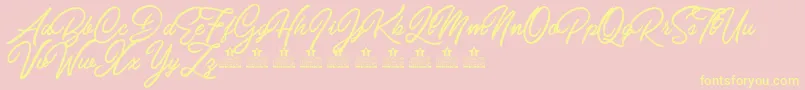 CarolinaMountainsPersonalUse-fontti – keltaiset fontit vaaleanpunaisella taustalla