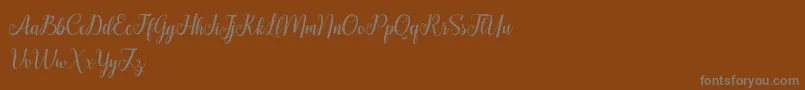 HellifaDemo-Schriftart – Graue Schriften auf braunem Hintergrund