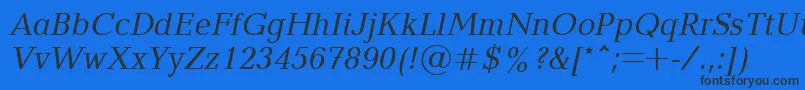 Blt56C Font – Black Fonts on Blue Background