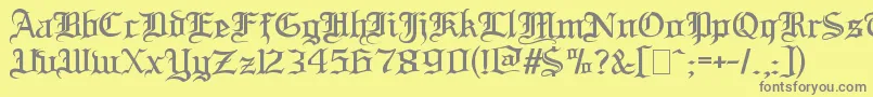 フォントBloodandblade – 黄色の背景に灰色の文字