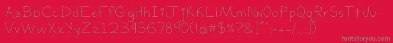 フォントTheblurryeffect – 赤い背景に灰色の文字