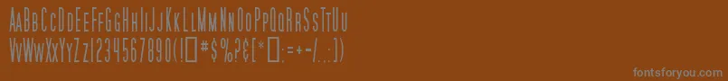 SfMoviePosterCondensed-fontti – harmaat kirjasimet ruskealla taustalla