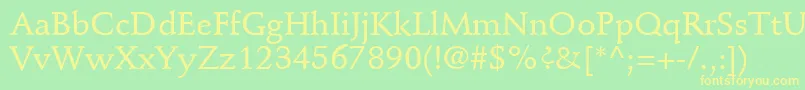 フォントStempelSchneidlerLtMedium – 黄色の文字が緑の背景にあります