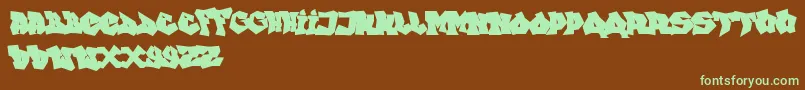 FtfIndonesianaGoGraffitiana Font – Green Fonts on Brown Background