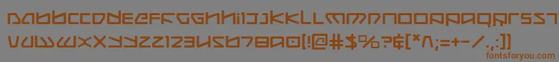 フォントKobold – 茶色の文字が灰色の背景にあります。