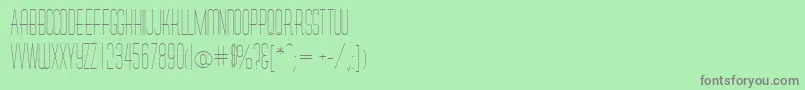 MelaninRegular Font – Gray Fonts on Green Background