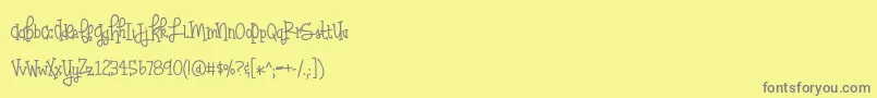 BmdHuffleclaw-Schriftart – Graue Schriften auf gelbem Hintergrund