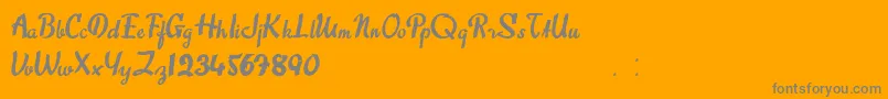 SweetAbout-Schriftart – Graue Schriften auf orangefarbenem Hintergrund