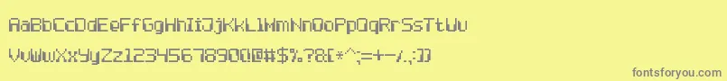 フォントComputerPixel7 – 黄色の背景に灰色の文字