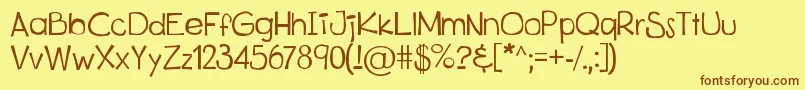 Fonte KitsuXd – fontes marrons em um fundo amarelo