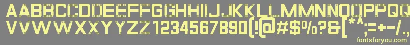 Gratis-fontti – keltaiset fontit harmaalla taustalla