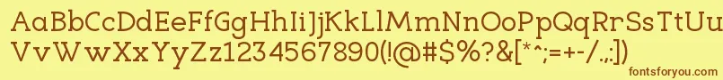 Шрифт EligibleRegular – коричневые шрифты на жёлтом фоне