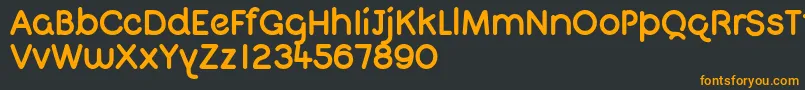 QuigletFree Font – Orange Fonts on Black Background