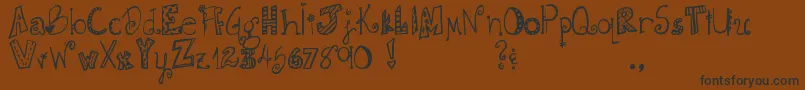 DjbDoodlieBeans Font – Black Fonts on Brown Background