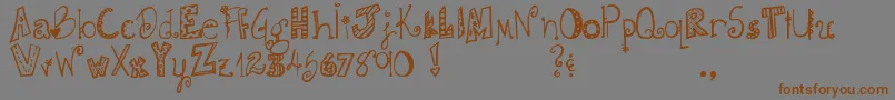 DjbDoodlieBeans-Schriftart – Braune Schriften auf grauem Hintergrund