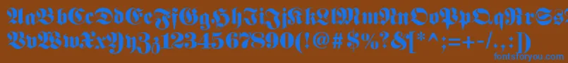 Fetteunzfraktur-fontti – siniset fontit ruskealla taustalla