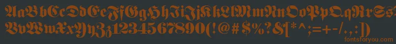 Шрифт Fetteunzfraktur – коричневые шрифты на чёрном фоне