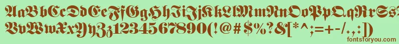 Шрифт Fetteunzfraktur – коричневые шрифты на зелёном фоне
