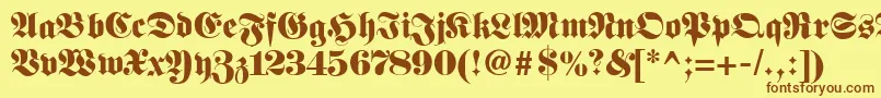 Fetteunzfraktur-Schriftart – Braune Schriften auf gelbem Hintergrund