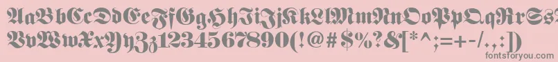 フォントFetteunzfraktur – ピンクの背景に灰色の文字