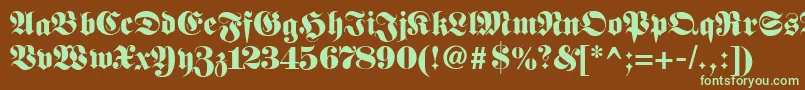 Fetteunzfraktur-fontti – vihreät fontit ruskealla taustalla