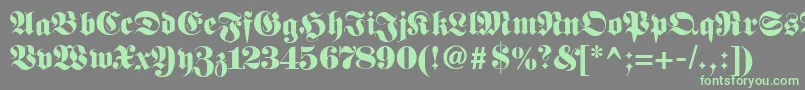 Fetteunzfraktur-Schriftart – Grüne Schriften auf grauem Hintergrund