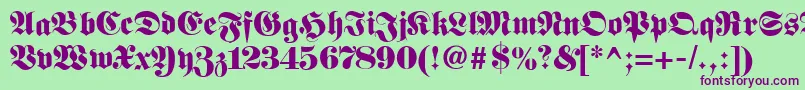 フォントFetteunzfraktur – 緑の背景に紫のフォント