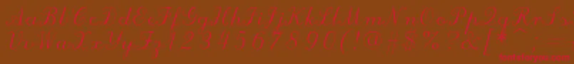 フォントScriptc – 赤い文字が茶色の背景にあります。