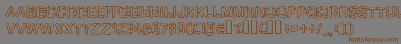 Fonte Funky Stoneage – fontes marrons em um fundo cinza