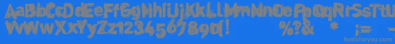 フォントDinstik – 青い背景に灰色の文字
