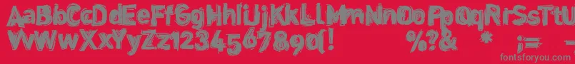 フォントDinstik – 赤い背景に灰色の文字