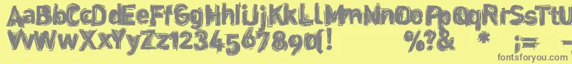 Dinstik Font – Gray Fonts on Yellow Background