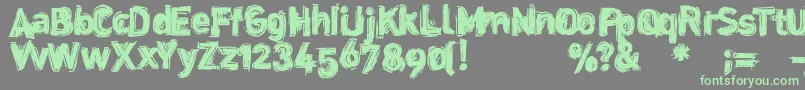 Dinstik Font – Green Fonts on Gray Background