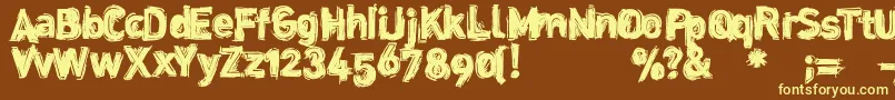 Dinstik Font – Yellow Fonts on Brown Background