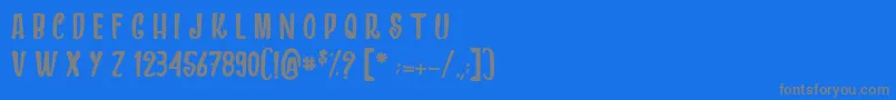 フォントDragonsAndChickens – 青い背景に灰色の文字