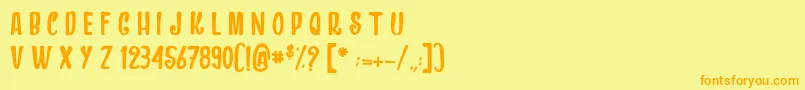 フォントDragonsAndChickens – オレンジの文字が黄色の背景にあります。